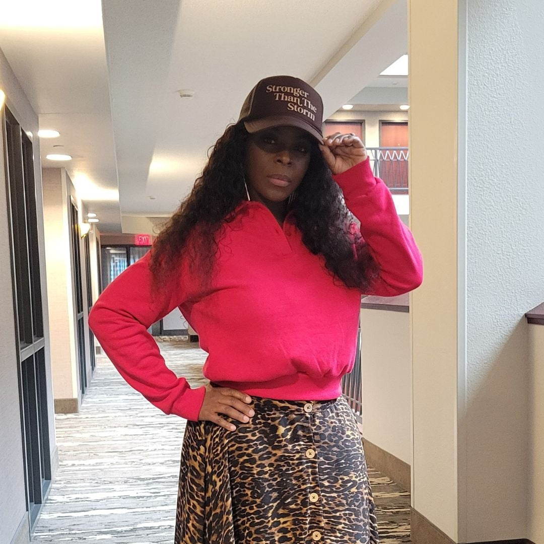 Stronger than the Storm trucker hat